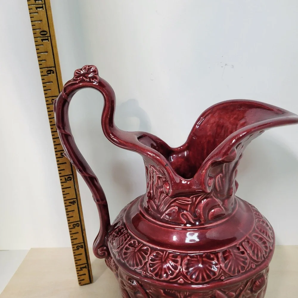 Vintage Burgundy Ceramic Pitcher Jug Relief Figures‎ Embossed Floral Design